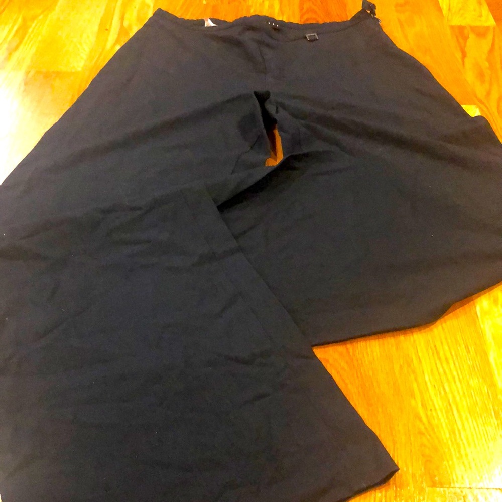 Ash black pants, casual work, zipper on the side with button. Wide leg no flare.